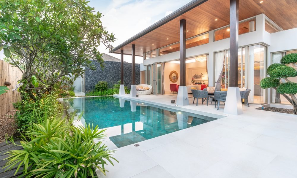 home or house Exterior design showing tropical pool villa with greenery garden,